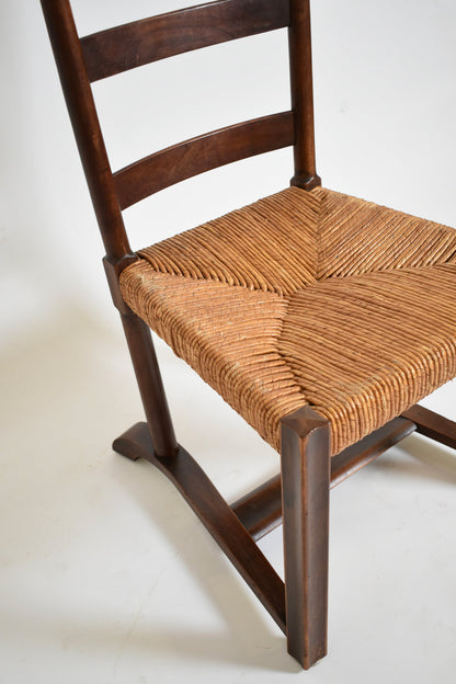 Wood and straw low chair, 1950s.