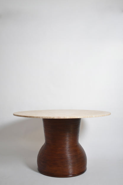 Rattan and travertine round dining table, 1970s.