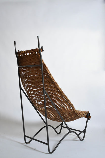 Wrought iron and rattan armchair, 1950s.
