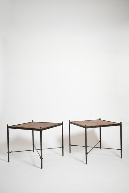 Pair of wrought iron and wicker side tables, 1970s.