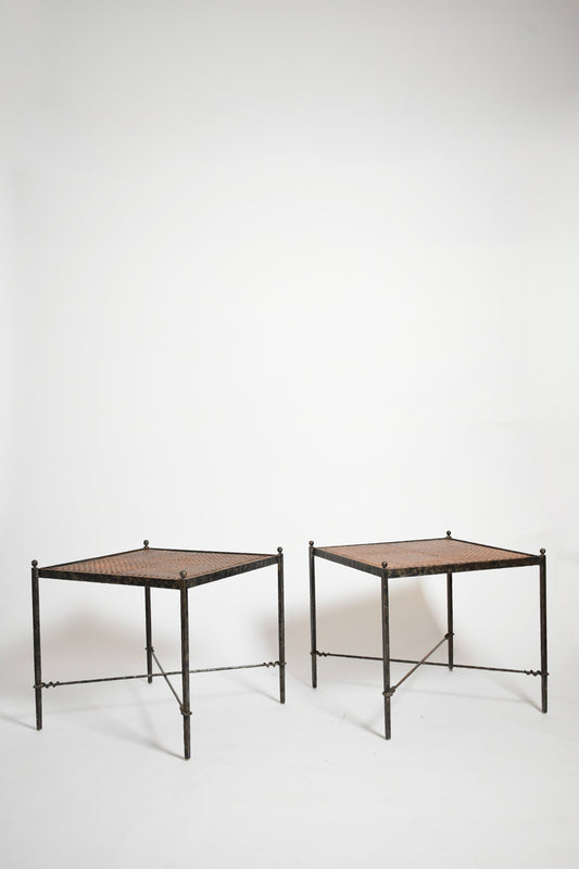 Pair of wrought iron and wicker side tables, 1970s.