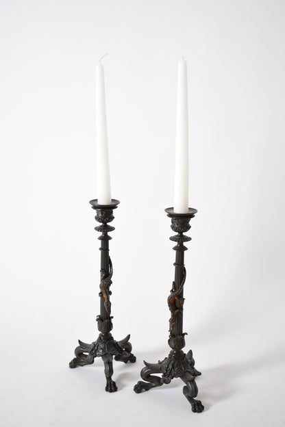 Set of four tripod zoomorphic bronze candleholders, XIXth c.