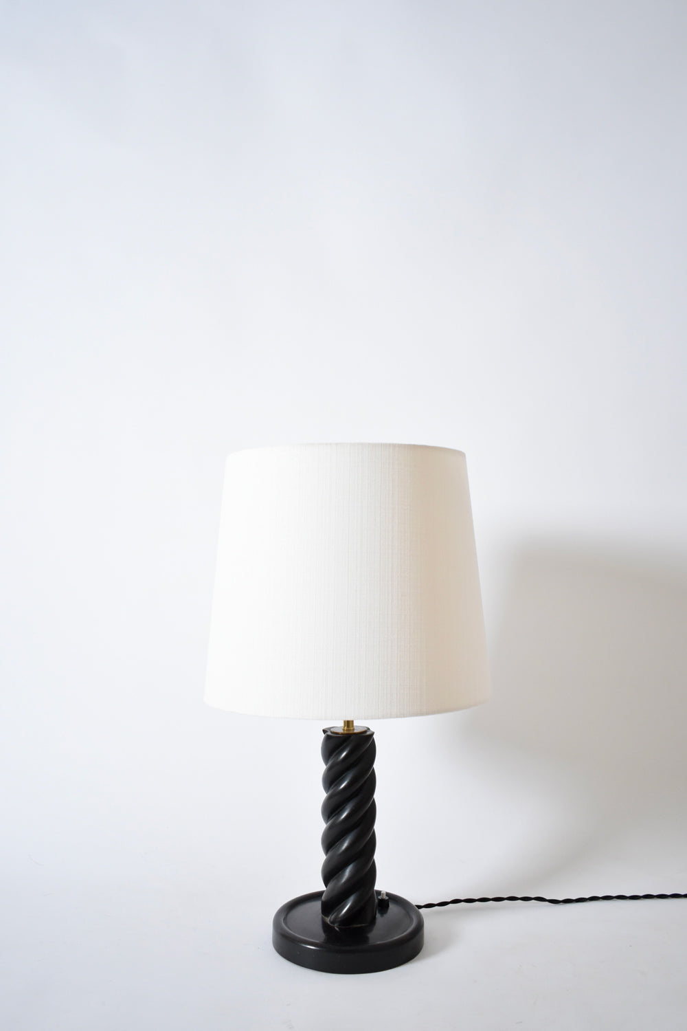Turned ebonised column table lamp, 1960s.