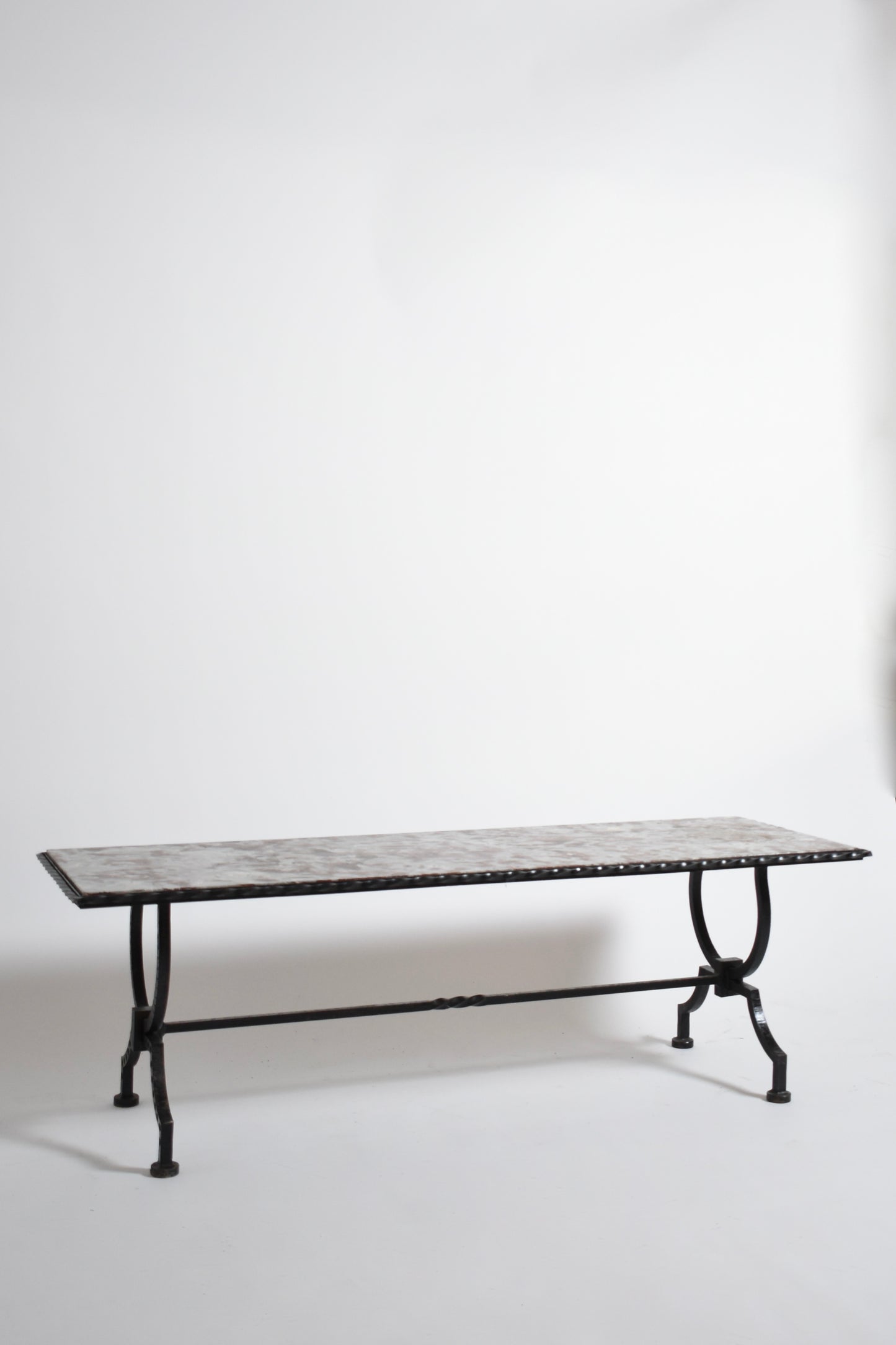 Wrought iron and marble coffee table, 1940s.