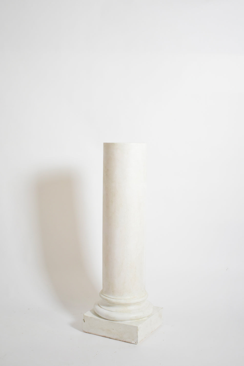 Pair of neoclassical plaster columns, 1930s.