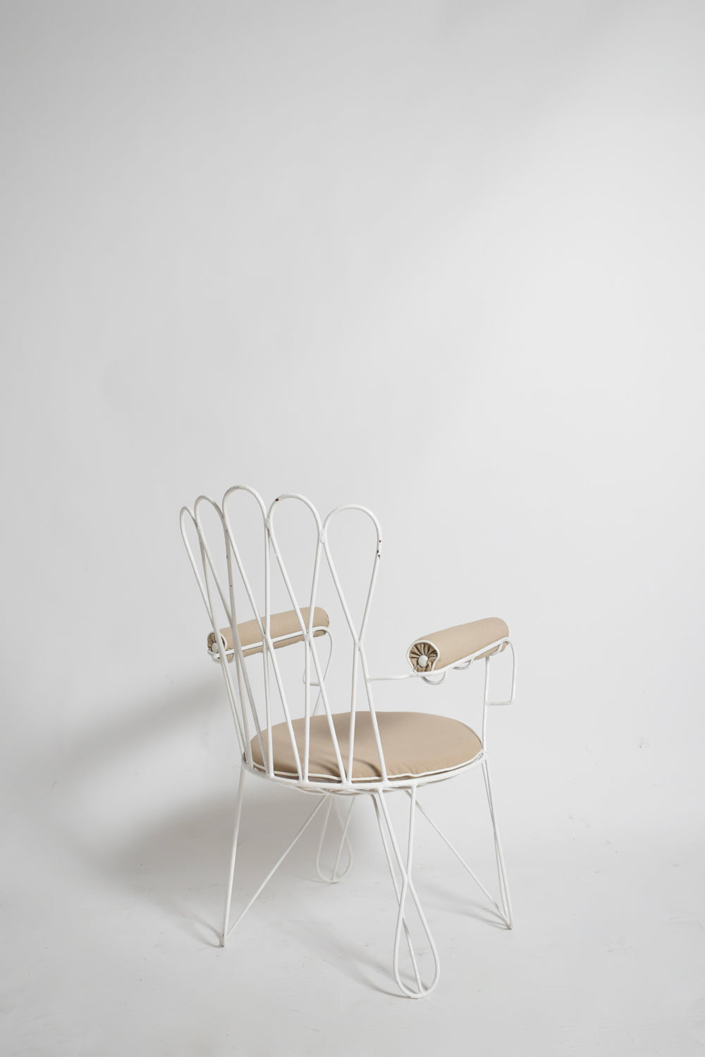 Pair of garden white wrought iron chairs, 1960s.