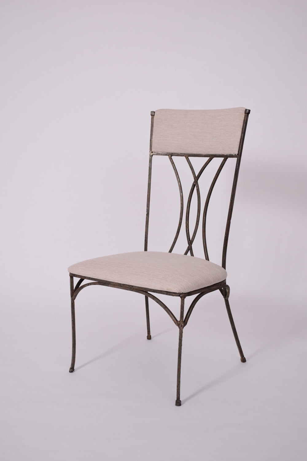 Pair of neoclassical iron chairs, 1960s.