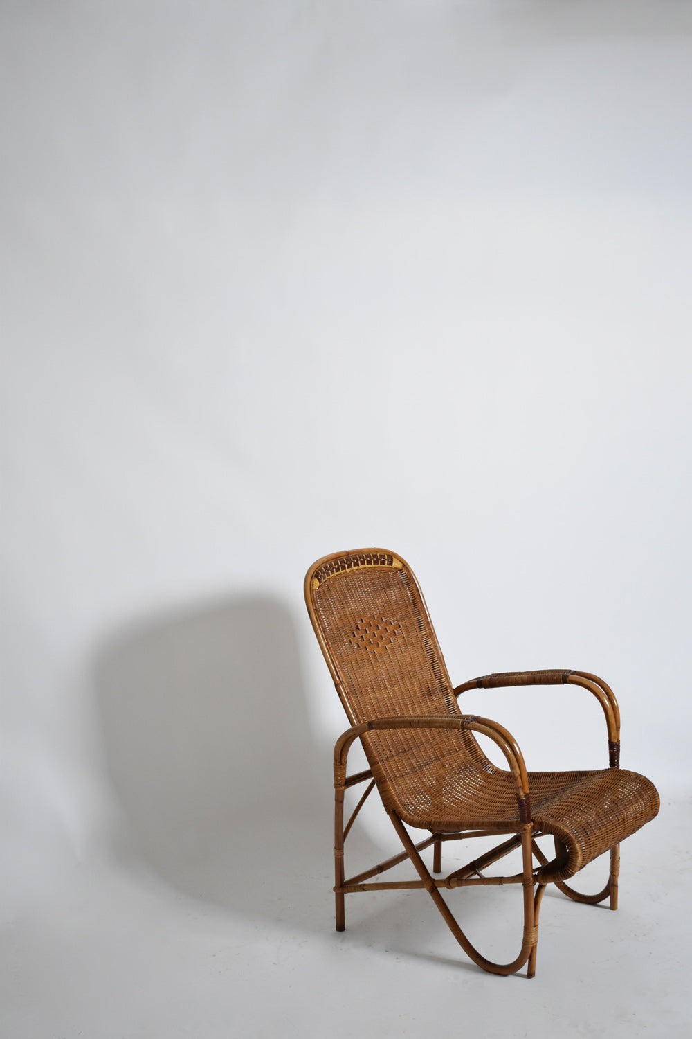 Rattan and wicker high back armchair, 1950s.