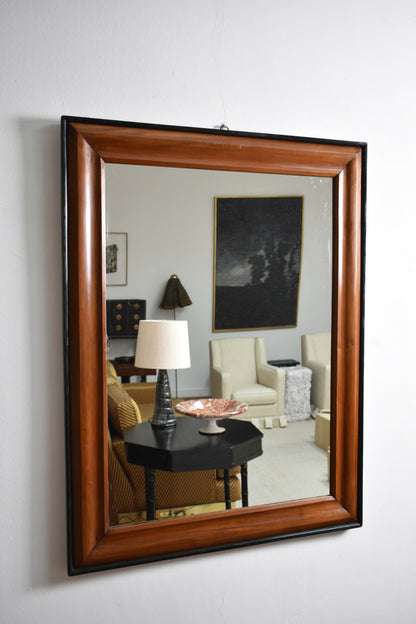 Pair of bicolor wood and ebonised wood mirrors, XIXth c.