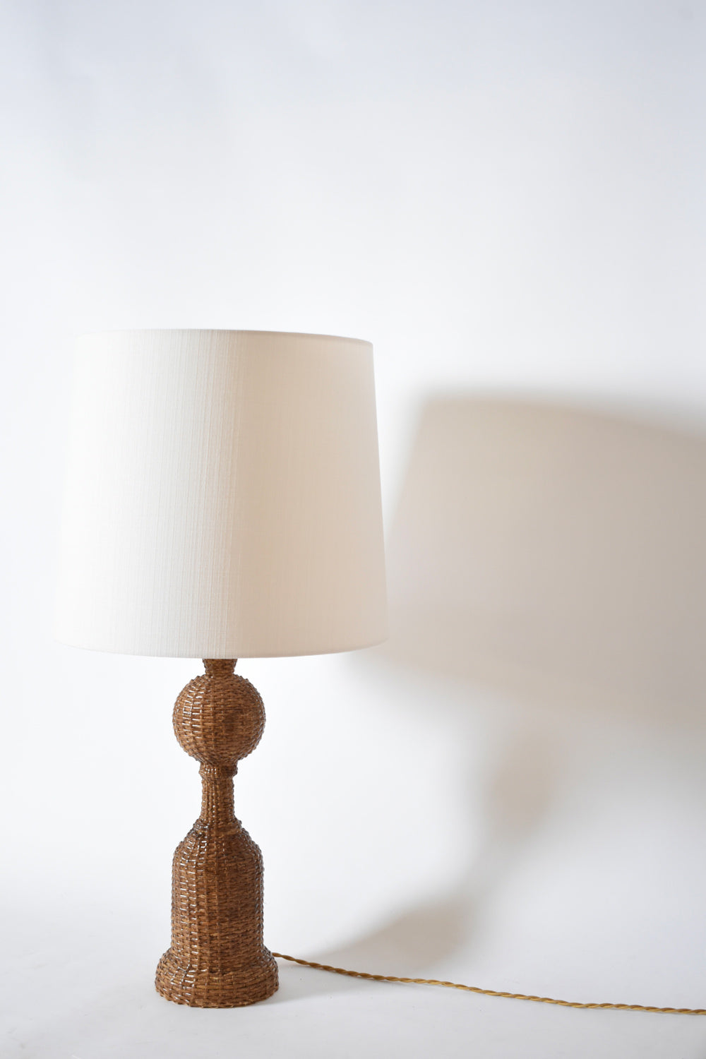 Rattan skin baluster table lamp, 1970s.