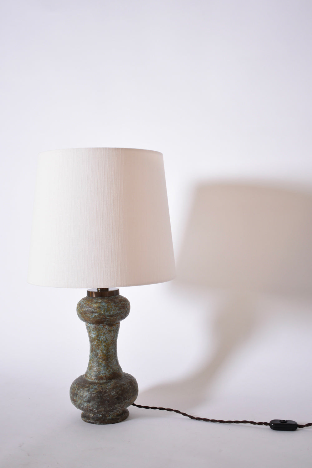 Green turquoise ceramic bilobed lamp, 1960s.