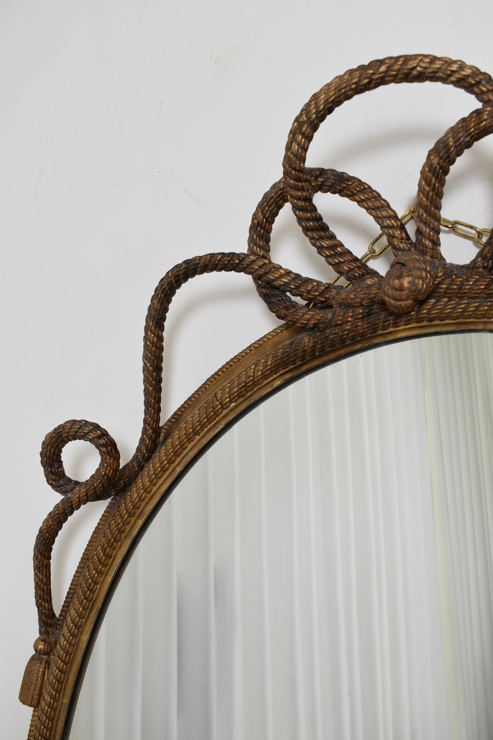 Important oval trimmings and pompoms mirror, XIXth c.