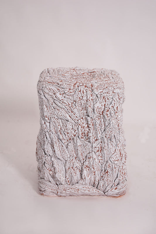 White textured ceramic side table by Helder, 2024.