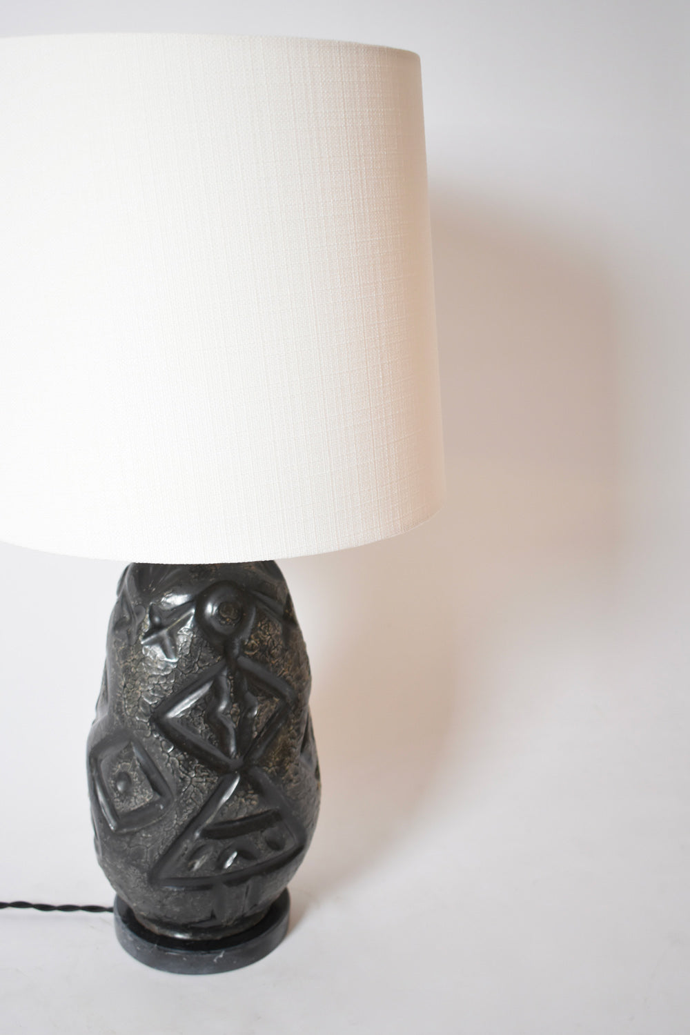 Africanist black ceramic lamp, 1960s.