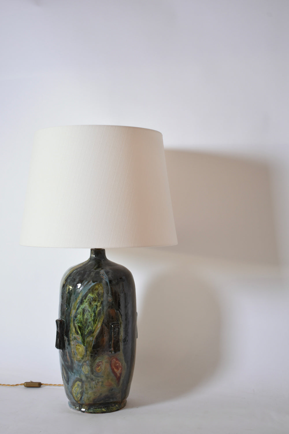 Important green, blue and yellow ceramic lamp Helder.