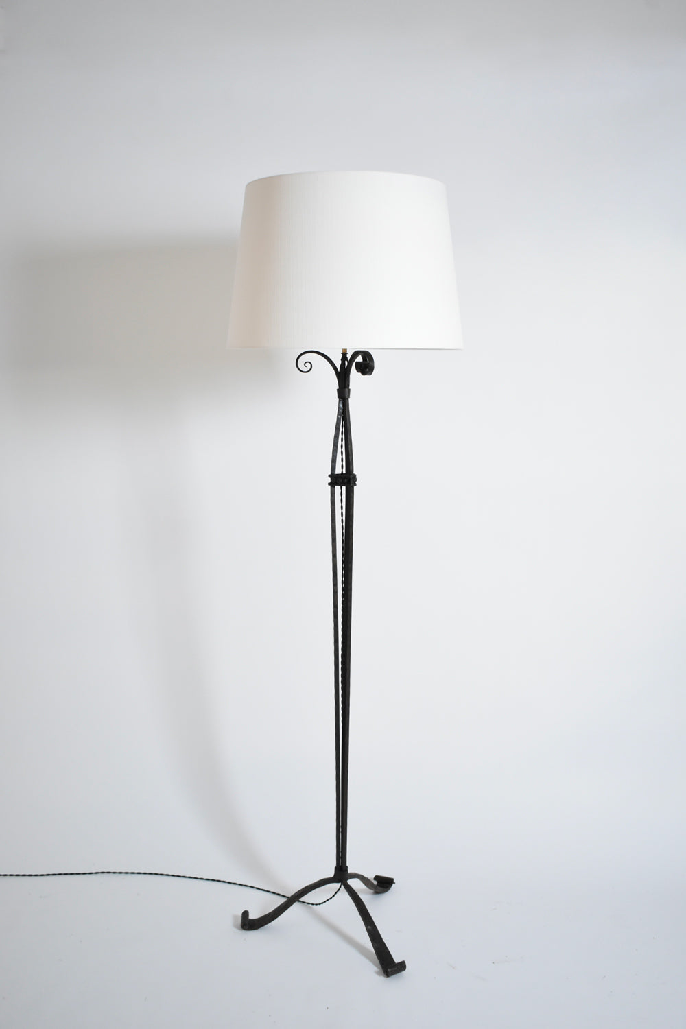 Scrollwork wrought iron floor lamp. 1930s.