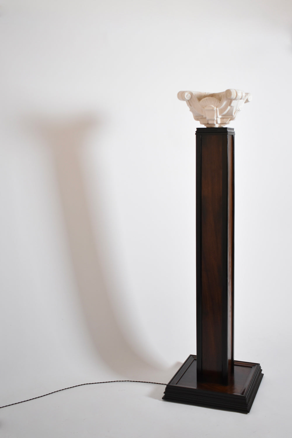 Wood and plaster floor lamp, 1930s.