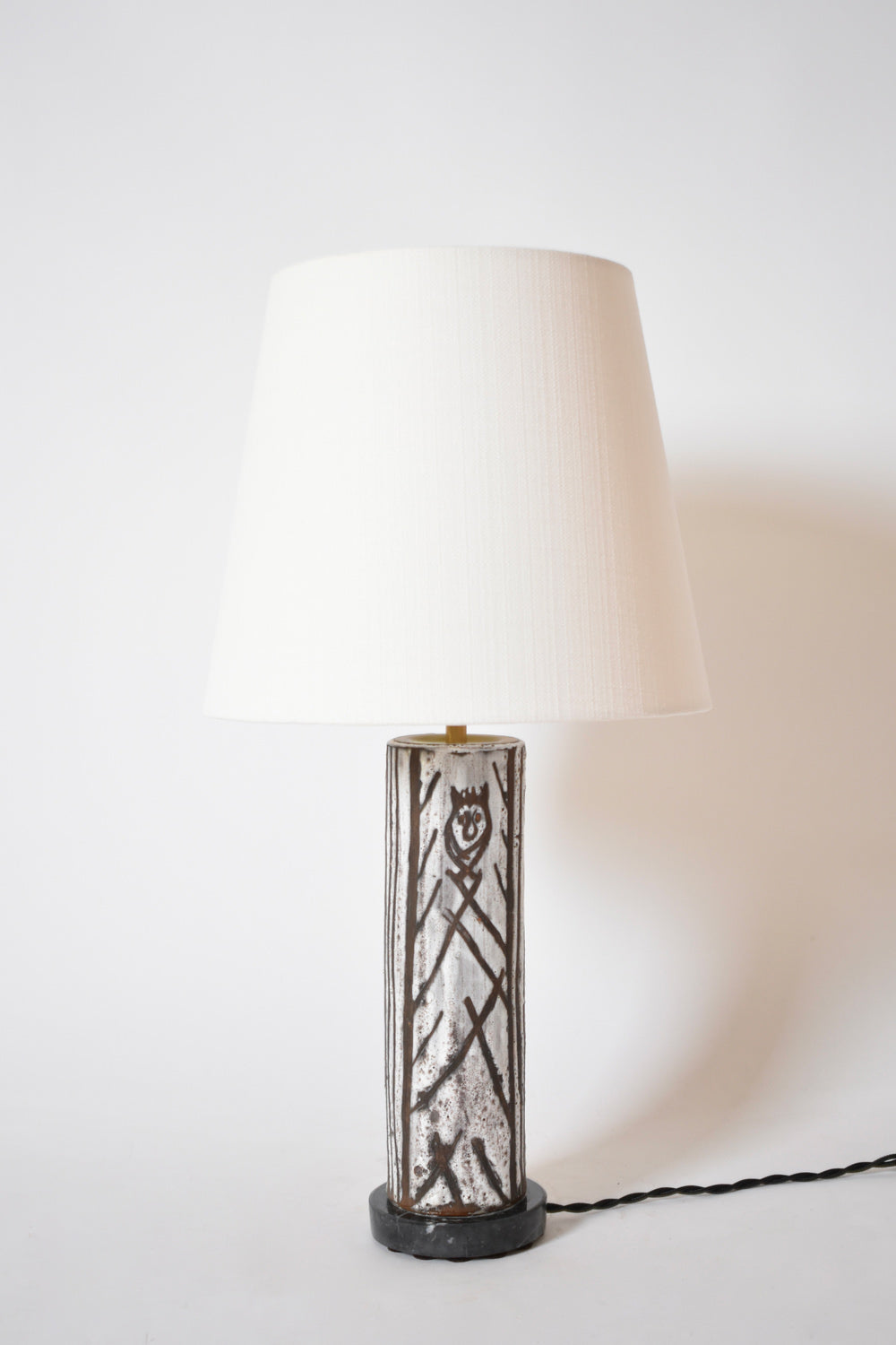 Glazed ceramic cylinder lamp with an incised pattern, 1950s.