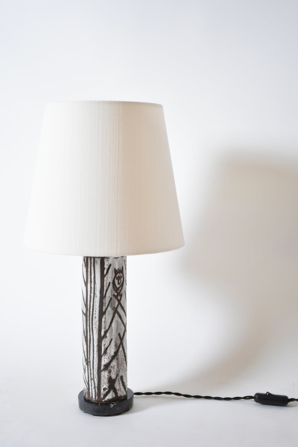 Glazed ceramic cylinder lamp with an incised pattern, 1950s.