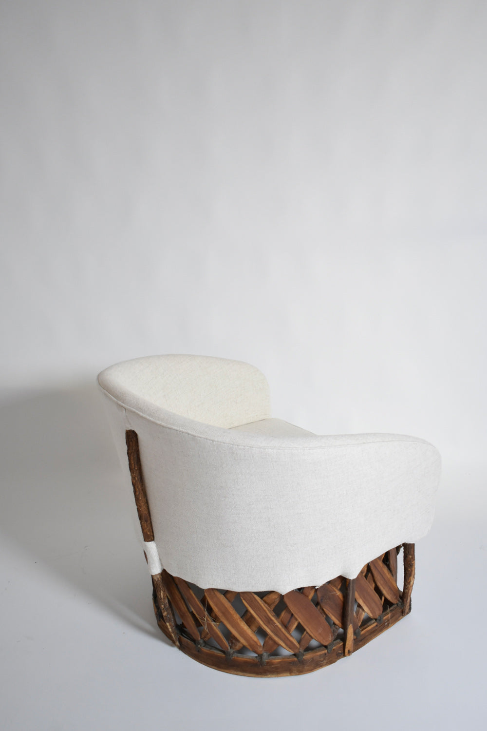 Pair of large wood and fabric mexican armchairs, 1970s.