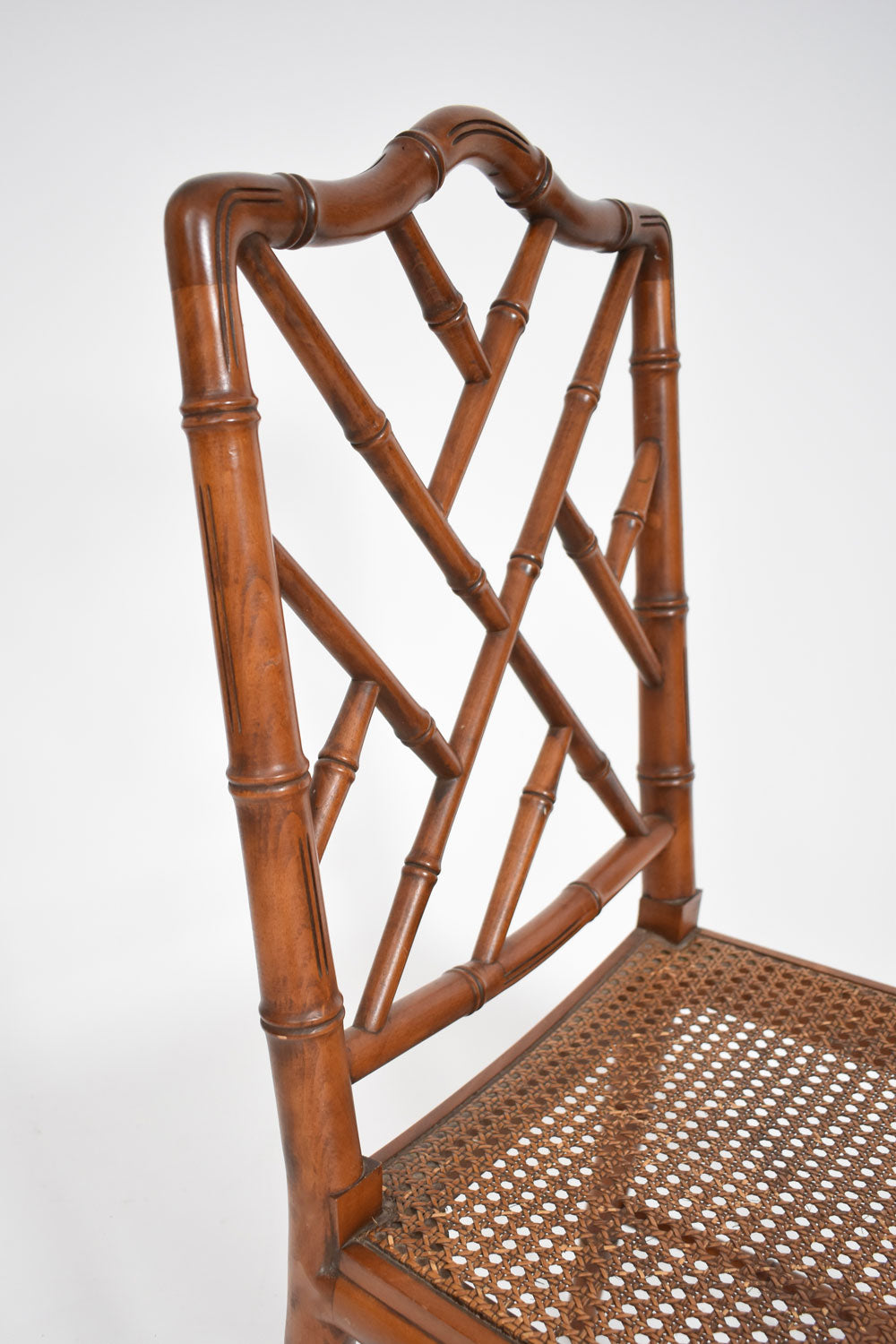 Set of 8 faux bamboo and canning chairs, 1970s.