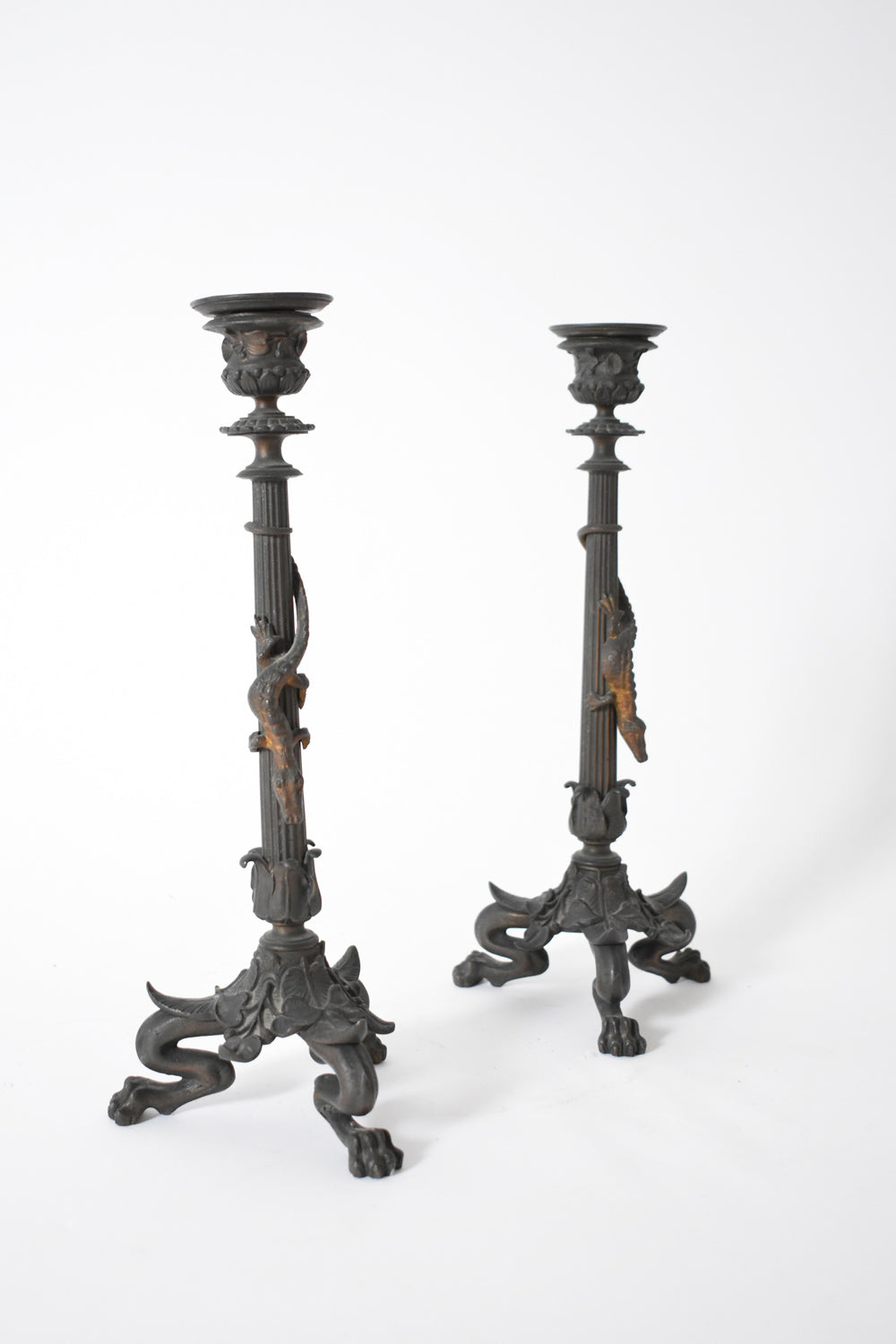 Pair of zoomorphic bronze candle holders,  XIXth c.