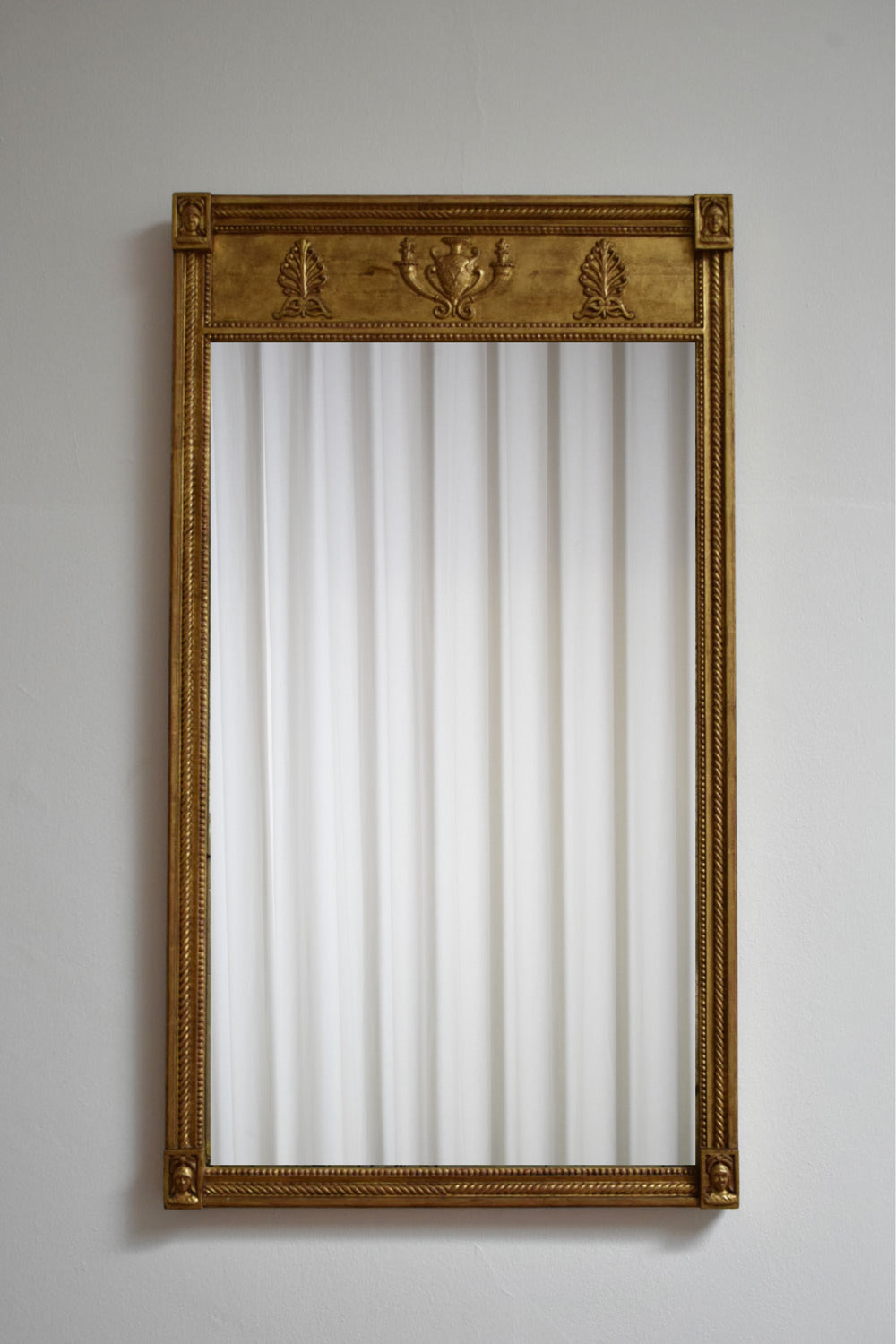 Gilded neoclassical style mirror, XIXth c.