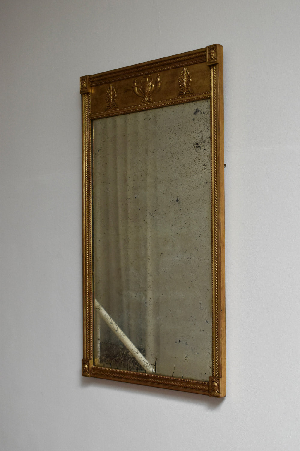 Gilded neoclassical style mirror, XIXth c.