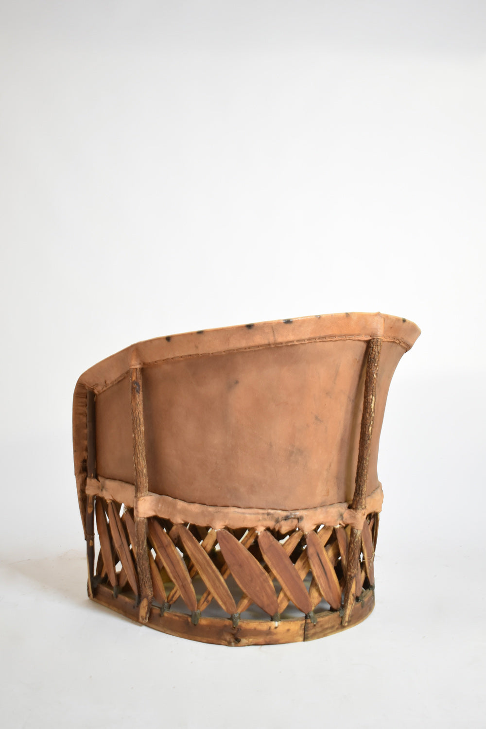 Pair of large wood and leather mexican armchairs, 1970s.