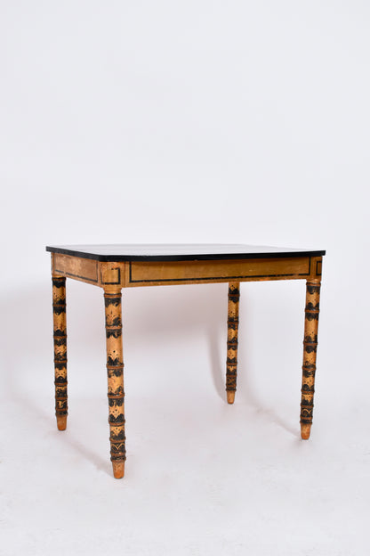 Ebonised and gold painted table, 1920s.