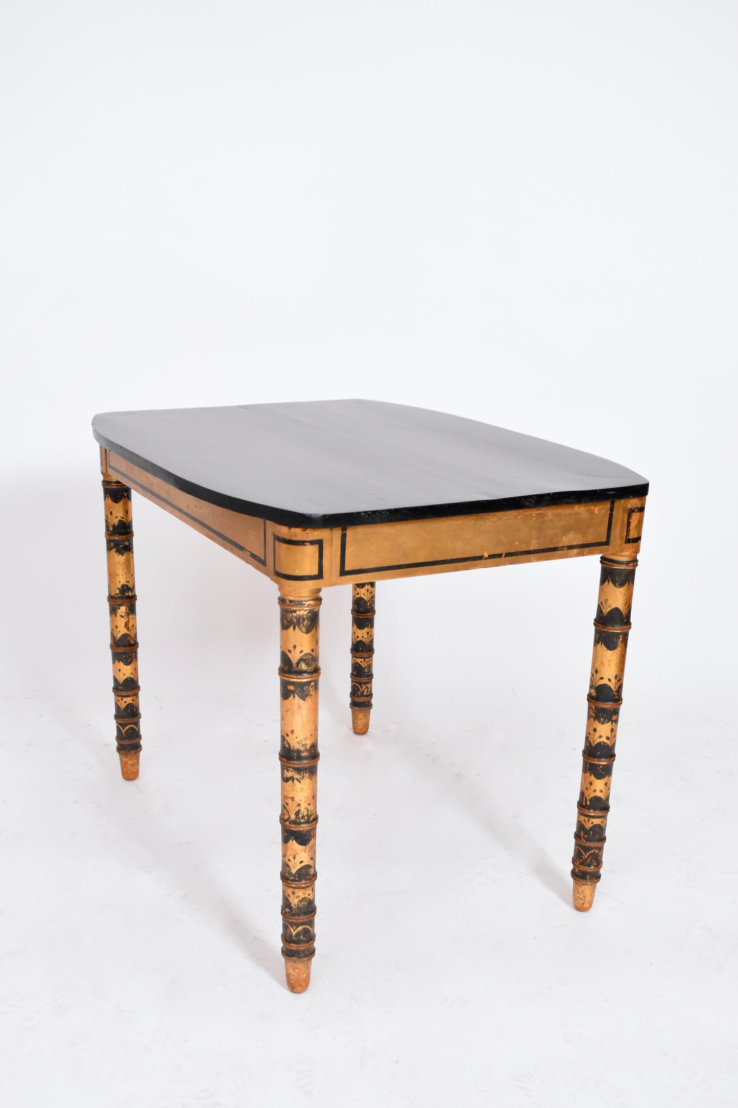 Ebonised and gold painted table, 1920s.