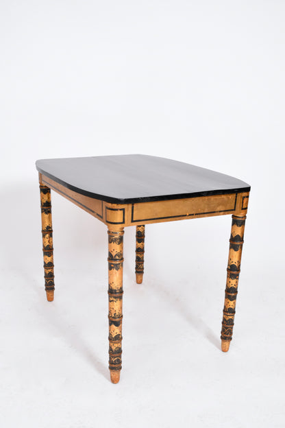 Ebonised and gold painted table, 1920s.