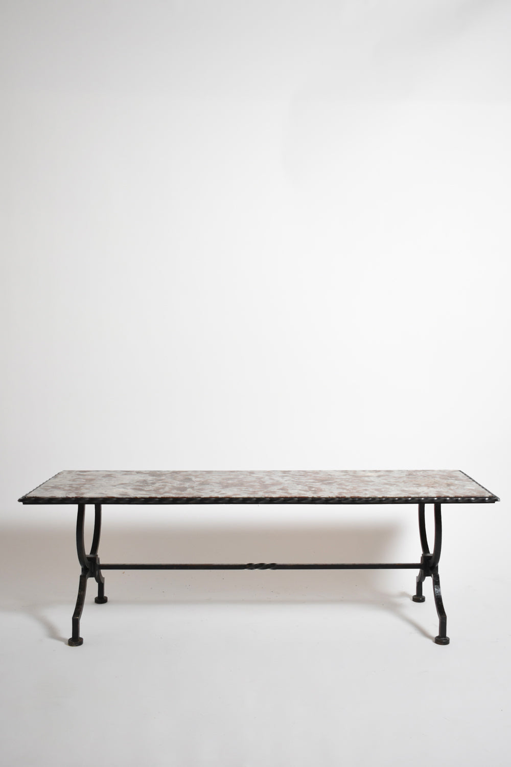 Wrought iron and marble coffee table, 1940s.