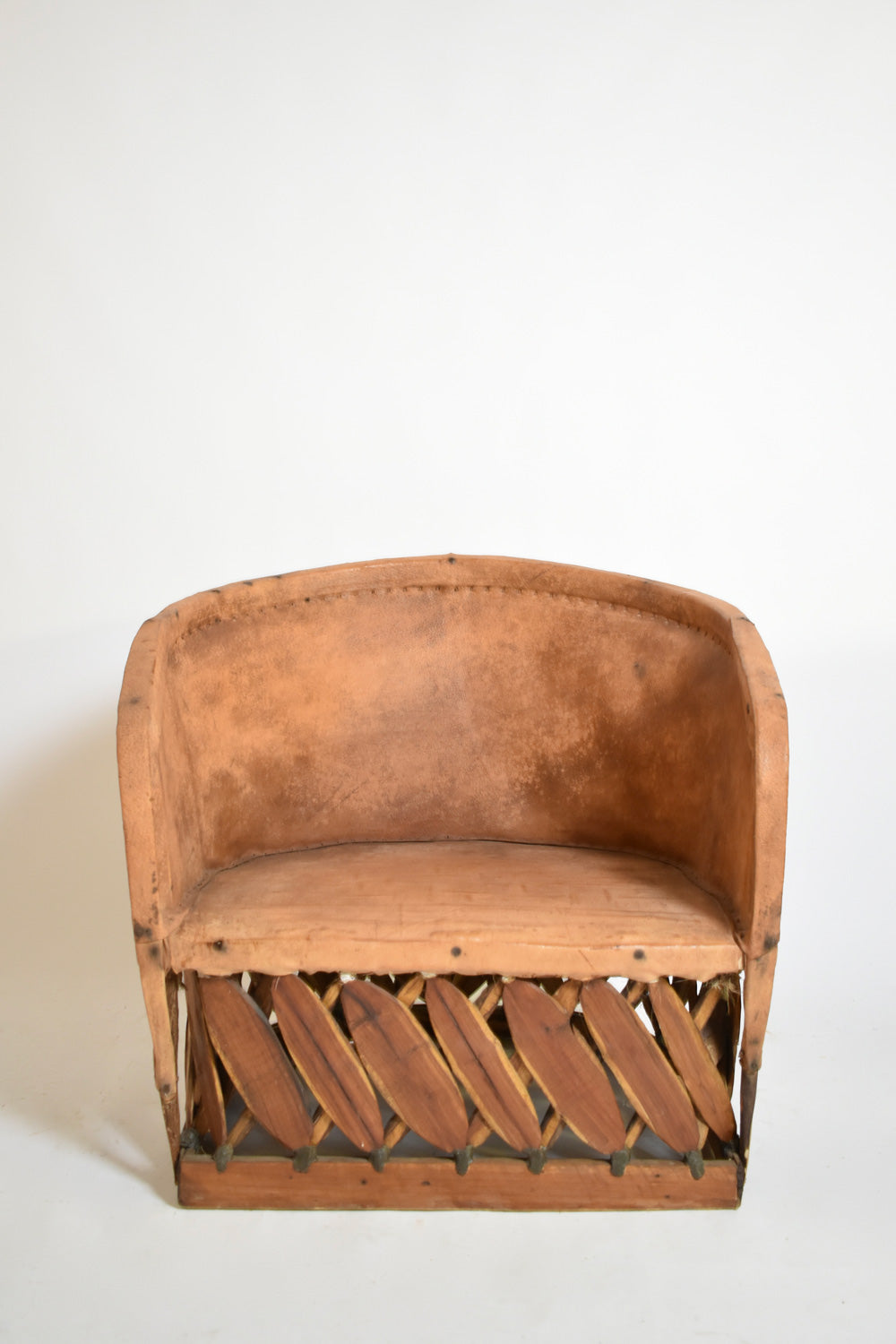 Pair of large wood and leather mexican armchairs, 1970s.
