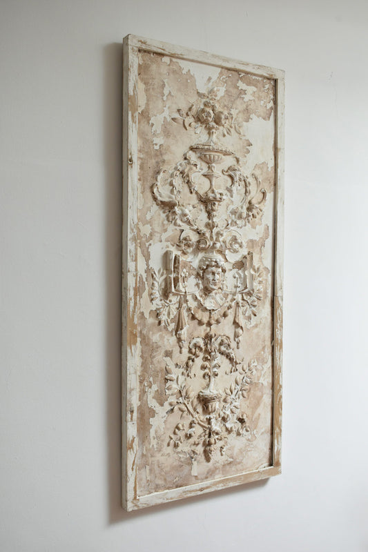 Plaster stucco vase and cherub low relief, XIXth c.