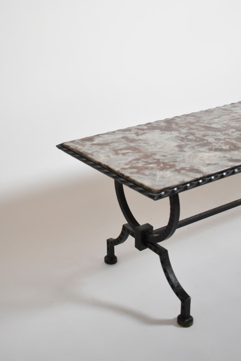 Wrought iron and marble coffee table, 1940s.