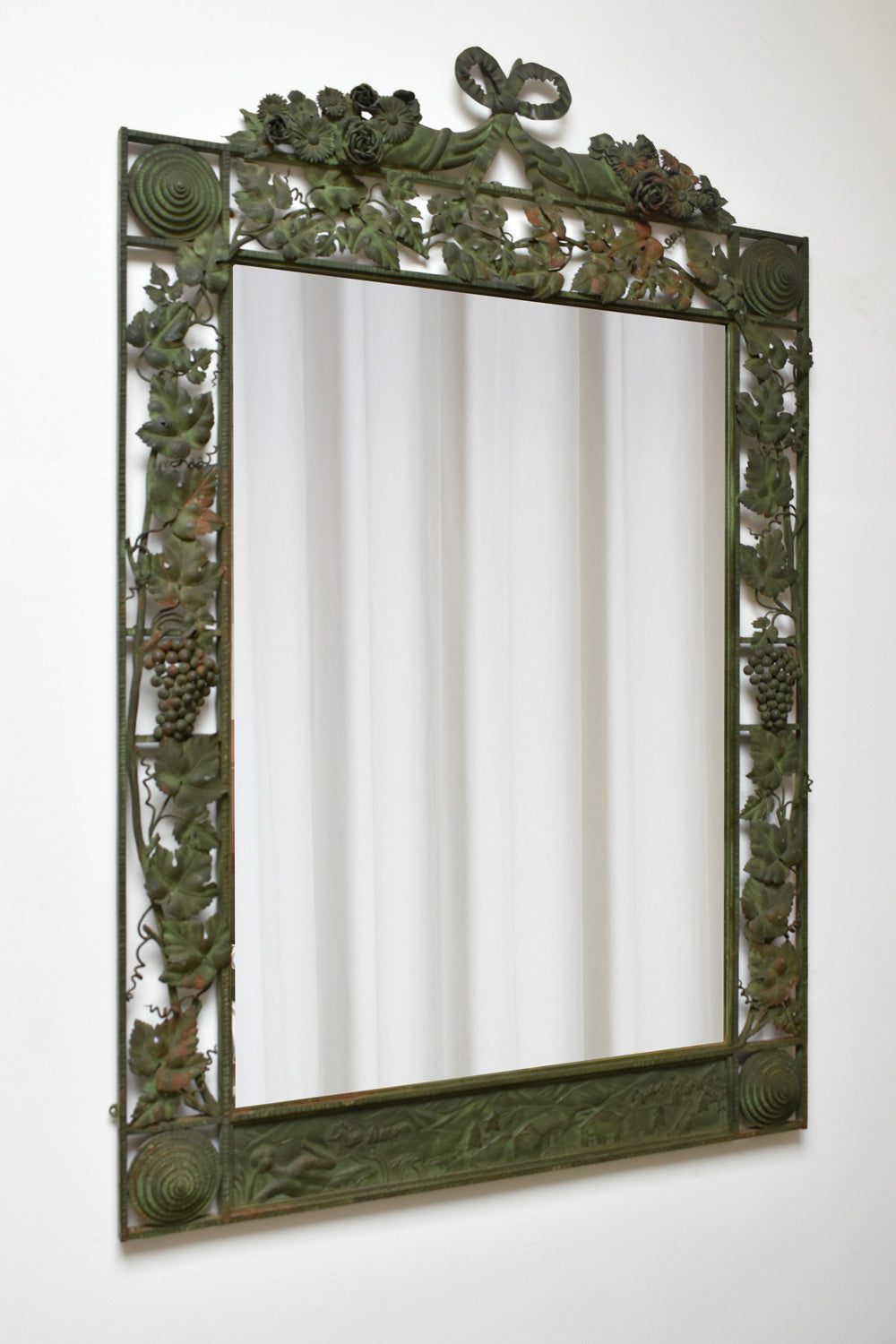 Large floral wrought iron mirror, XIXth c.