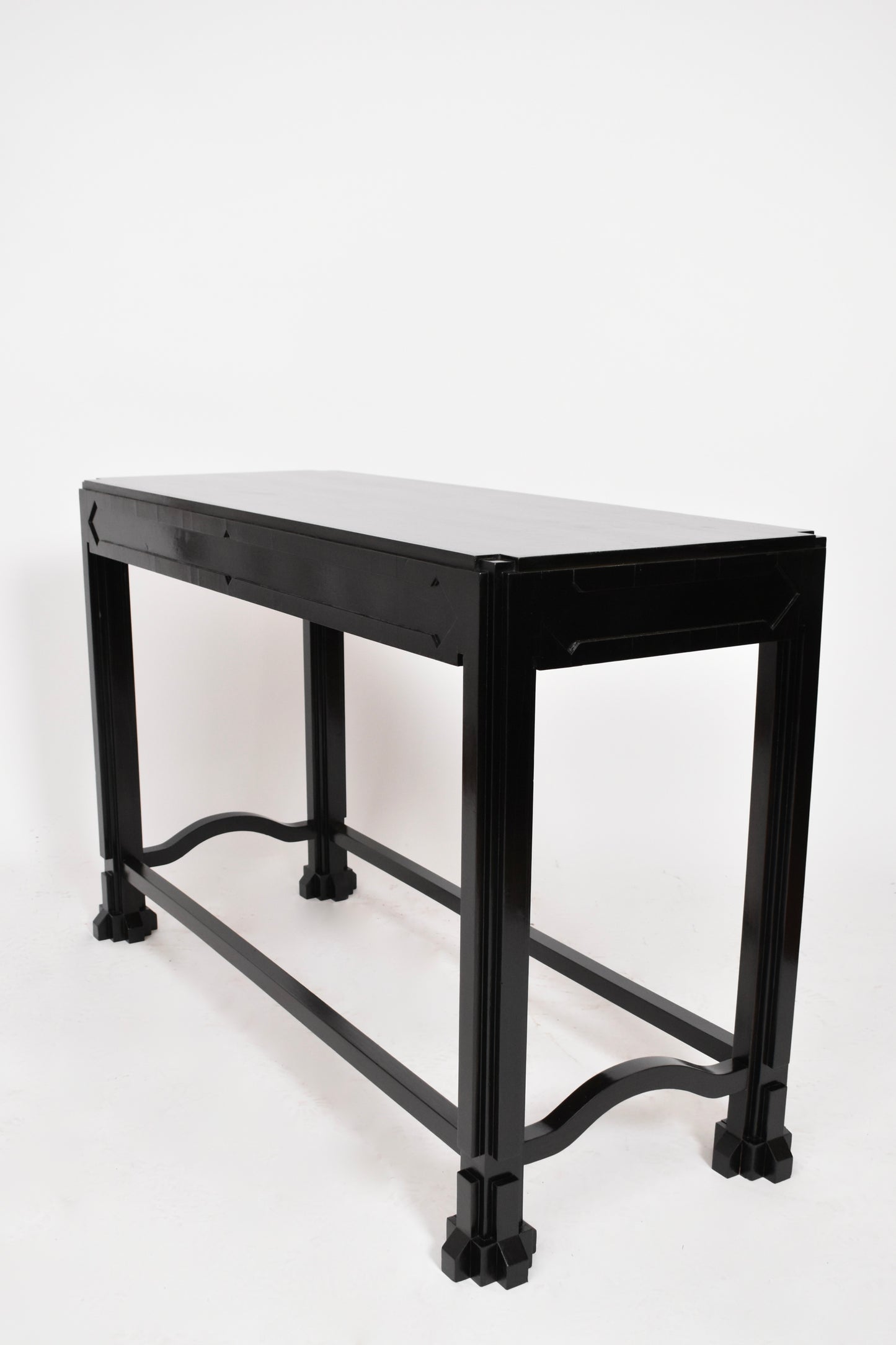 Ebonised wooden console, 1980s.