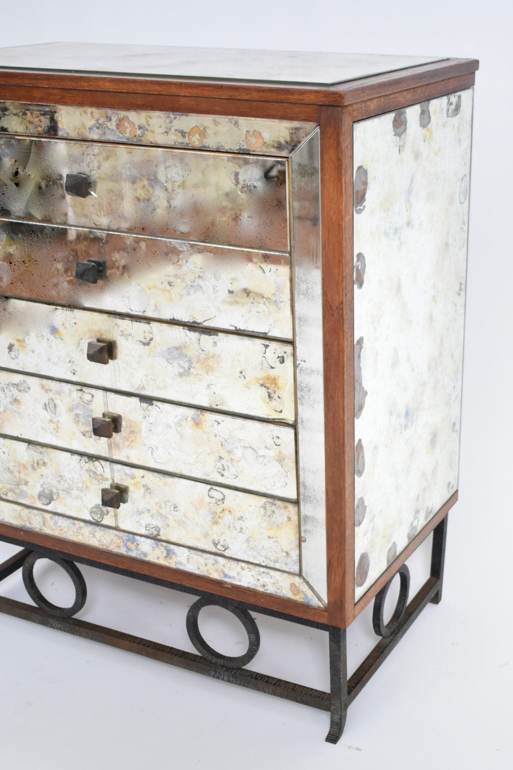 Mirrors and wrought iron chest of drawers, 1940s.