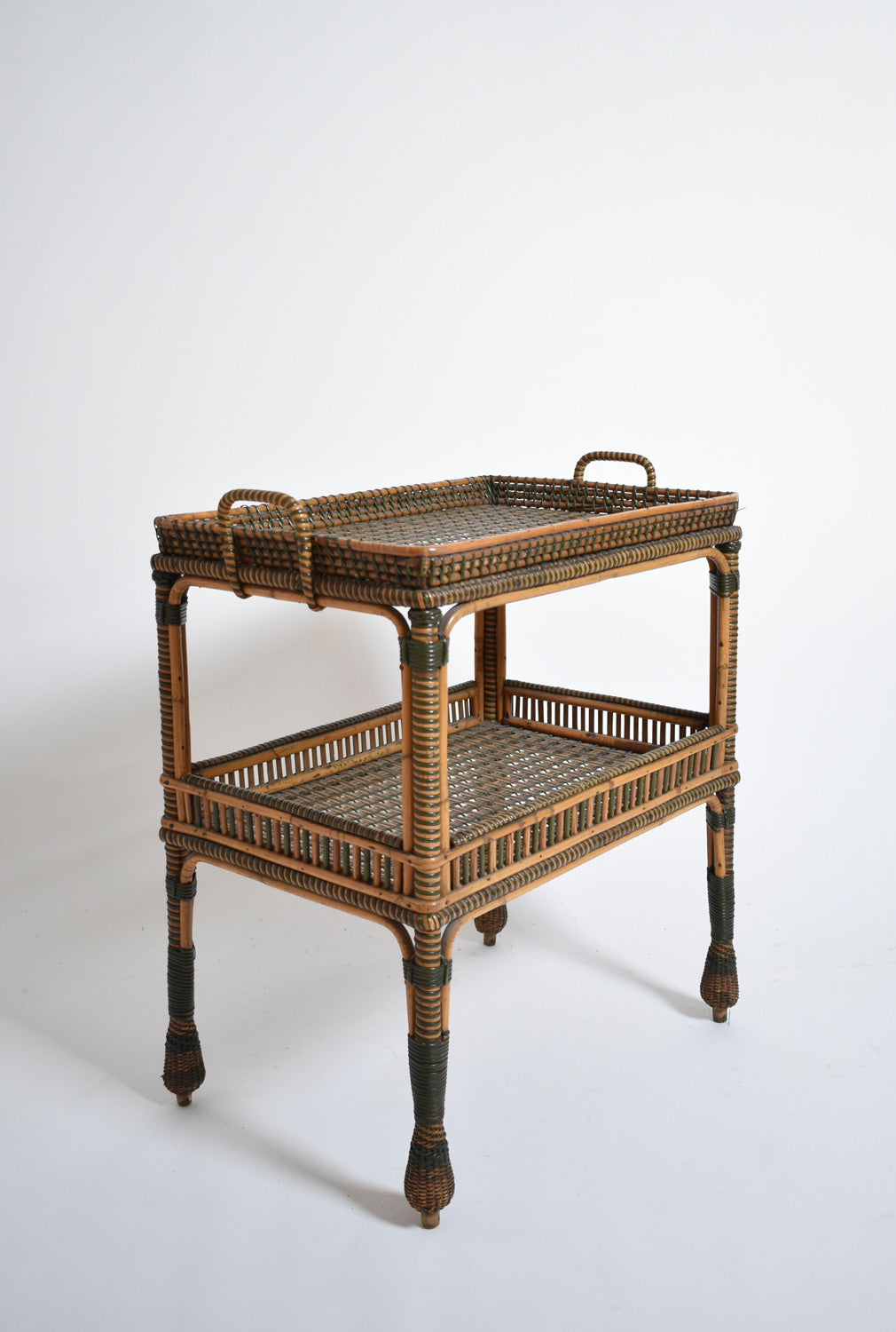 Green and natural rattan side table, 1920s.