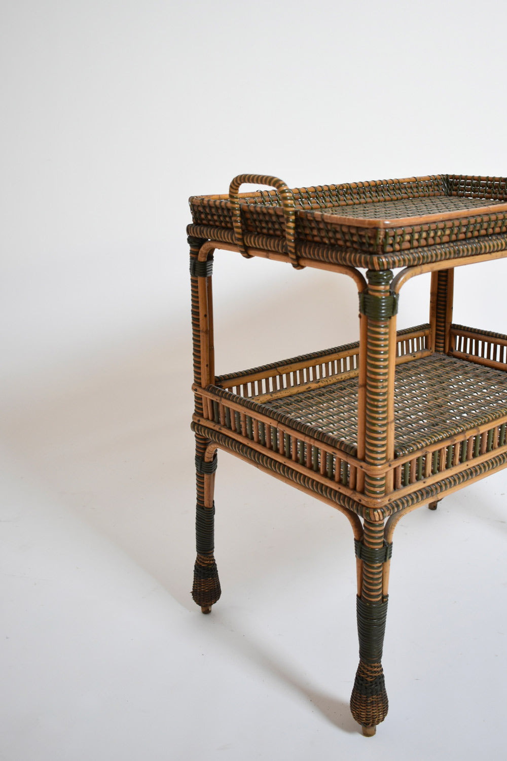 Green and natural rattan side table, 1920s.