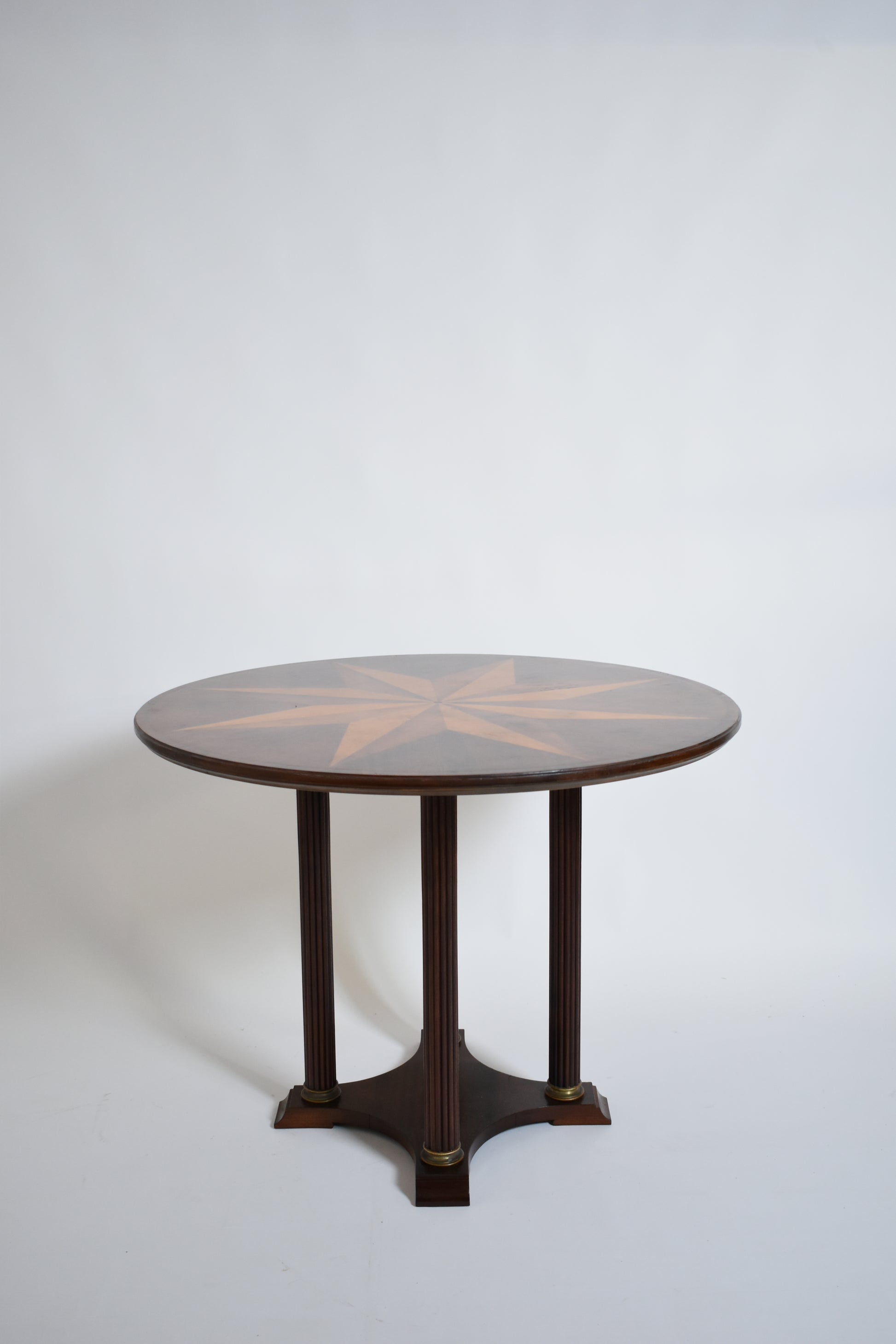 Neoclassical star marquetry pedestal table, 1960s.