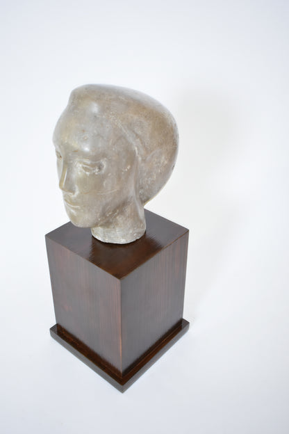 Marble woman's face sculpture, 1940s.