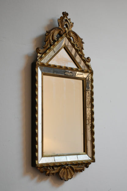 Set of four Pierre Dariel acanthus pediment mirrors, 1940s.