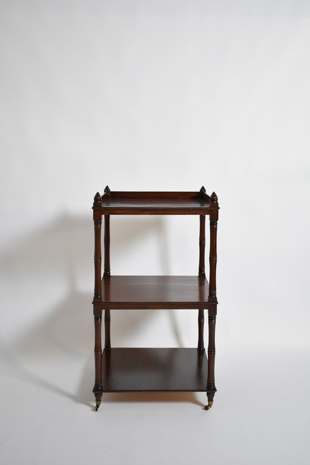 Faux bamboo bookshelves pedestal table, 1960s.