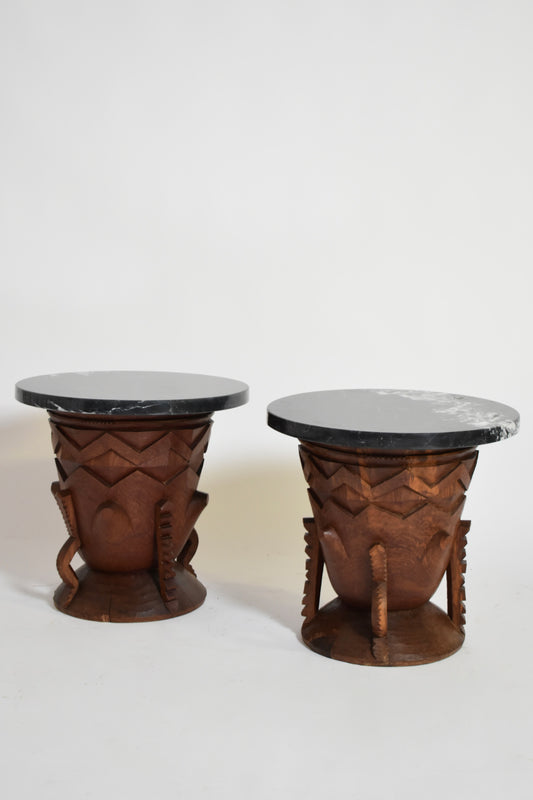 Two large African carved wooden side tables, 1960s.