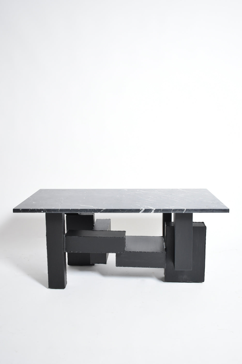Cubist iron and marble coffee table, 1980s.