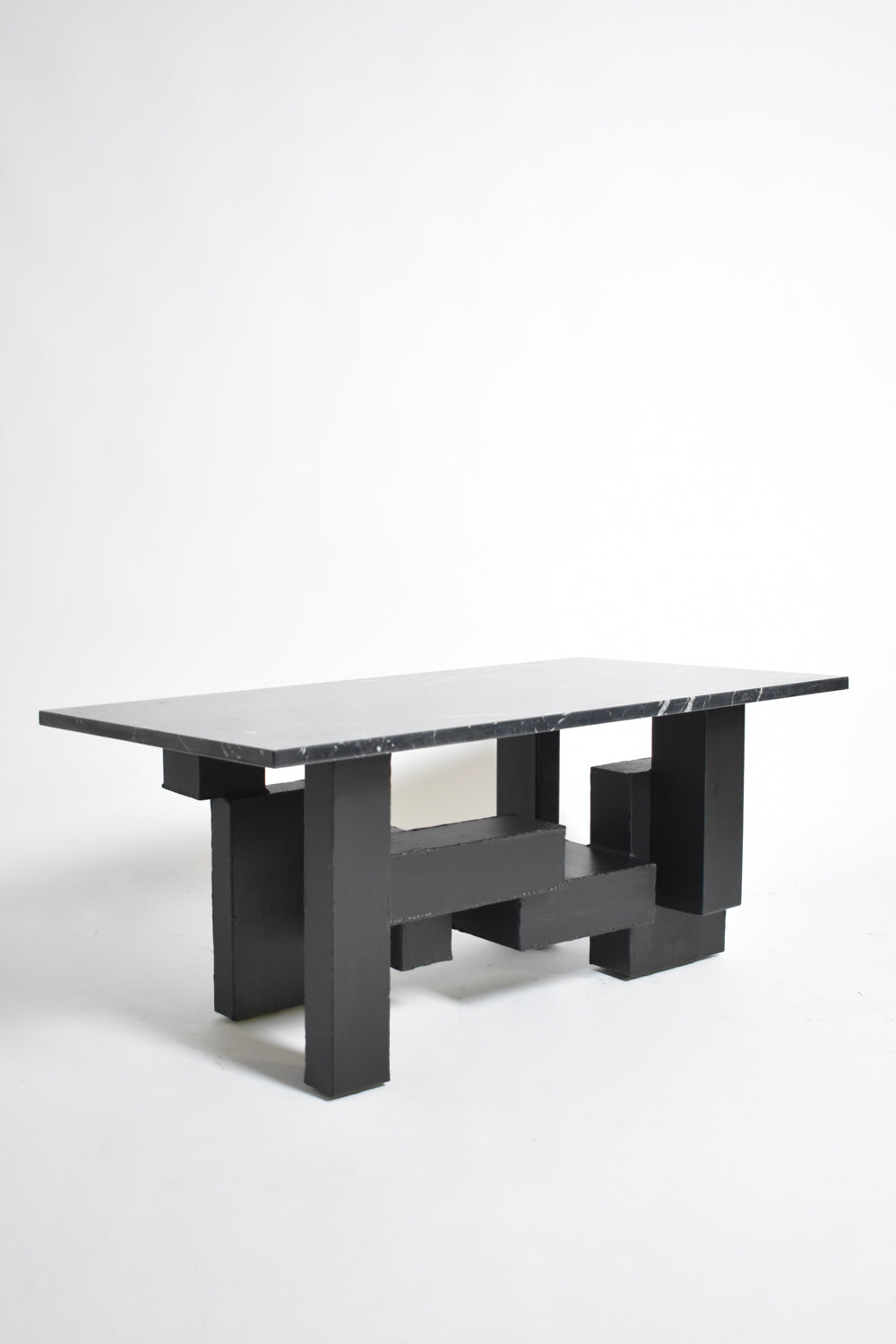 Cubist iron and marble coffee table, 1980s.
