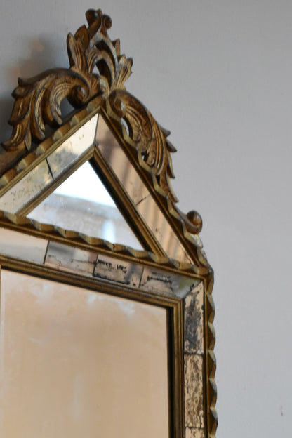 Set of four Pierre Dariel acanthus pediment mirrors, 1940s.