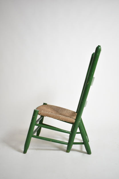 Green painted wood and straw fireside chair, 1960s.
